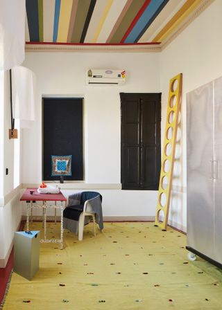 Room by Julie Richoz with yellow ladder