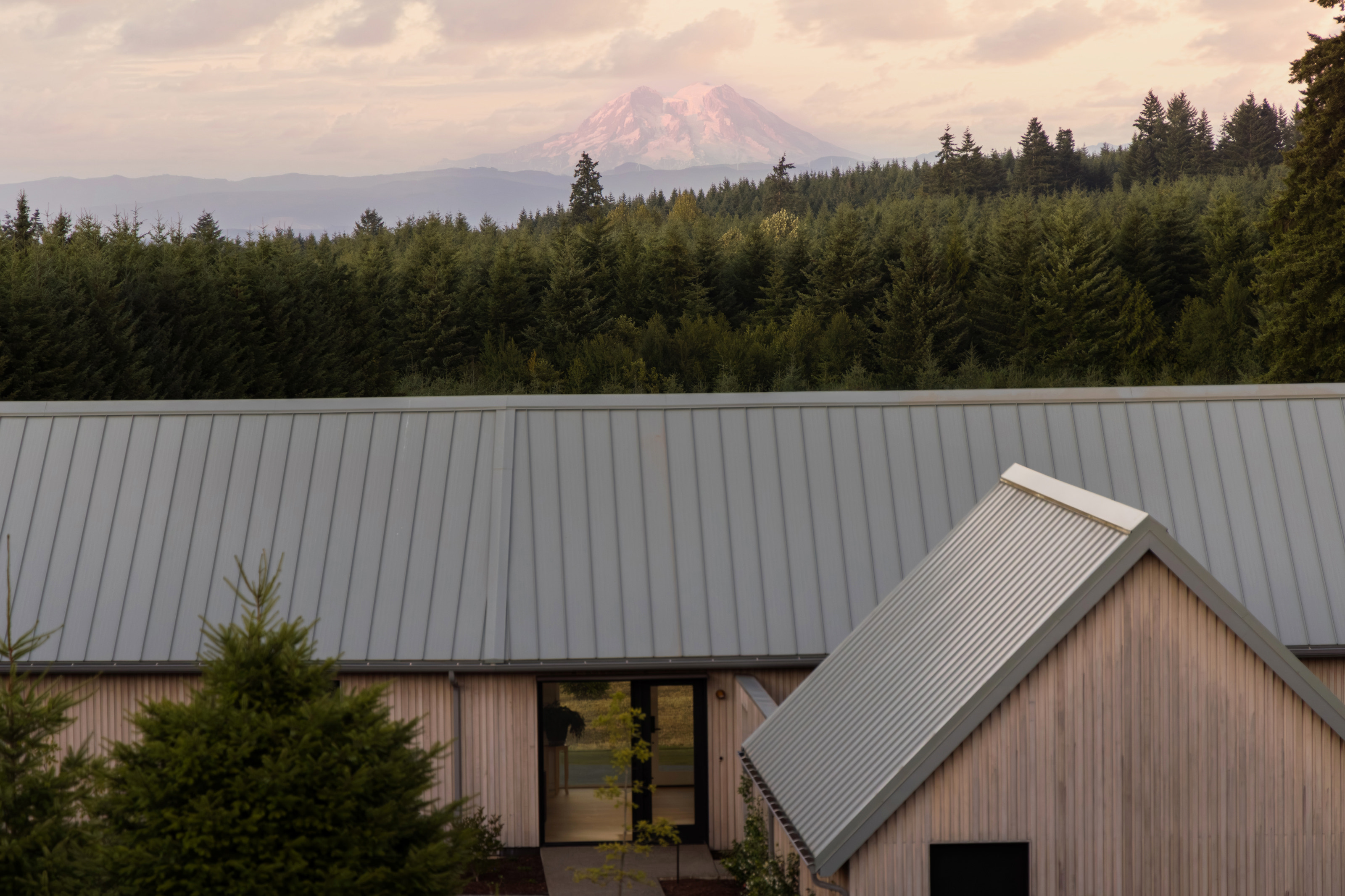 The house has a sunset view of Mount Rainier