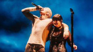 Oli Sykes on stage with Maphra