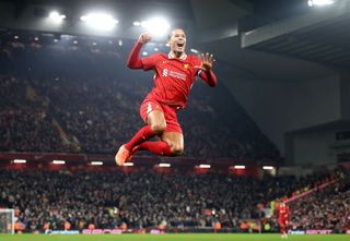 Virgil van Dijk of Liverpool celebrates scoring his team's fourth goal during the Carabao Cup Semi Final Second Leg match between Liverpool and Tottenham Hotspur at Anfield on February 06, 2025 in Liverpool, England.