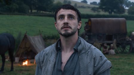 Paul Mescal looking up as William Shakespeare in Focus Features' Hamnet directed by Chloe Zhao