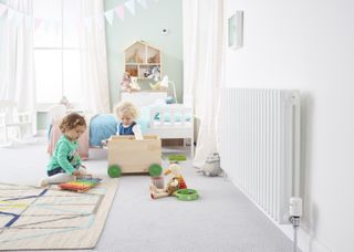 radiator in a child's room with smart heating controls