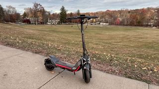 Segway Kickscooter ZT3 Pro parked on sidewalk