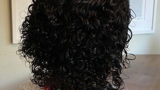 Girl with black curly hair