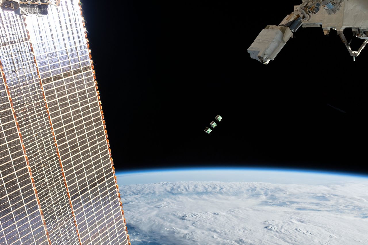 The three Cubesats being released into low Earth orbit