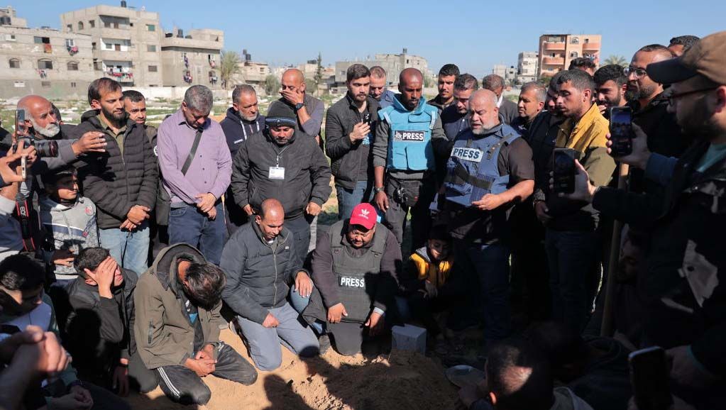 Mourners at the funeral for journalists killed in Israel-Hamas war