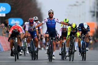 MILAN ITALY MARCH 16 Mark Cavendish of United Kingdom and Team QuickStep Alpha Vinyl celebrates at finish line as race winner ahead of LR Nacer Bouhanni of France and Team Arka Samsic Peter Sagan of Slovakia and Team Total Energies Andrea Vendrame of Italy and AG2R Citren Team Alexander Kristoff of Norway and Team Intermarch Wanty Gobert Matriaux and Max Kanter of Germany and Movistar Team during the 103rd MilanoTorino 2022 a 197km one day race from Magenta to Rivoli MilanoTorino on March 16 2022 in Milan Italy Photo by Tim de WaeleGetty Images