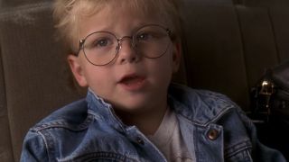 Jonathan Lipnicki with glasses looking up in Jerry Maguire