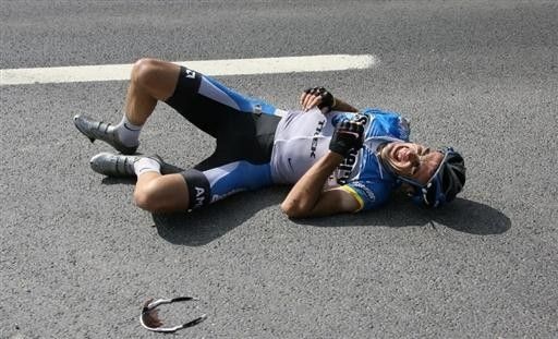 Egoi Martinez (Discovery) lies on the ground after a crash