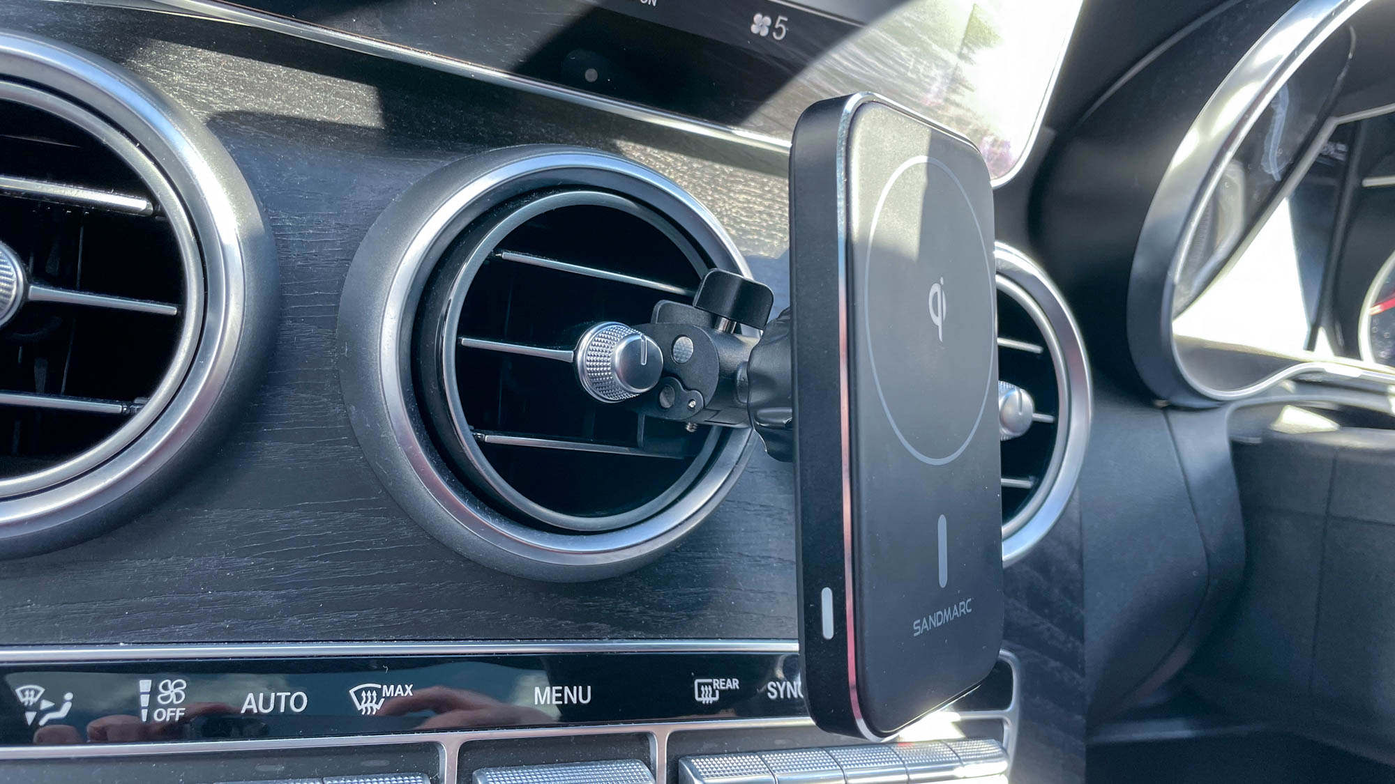 Sandmarc Active Car Mount shown attached to car dash vent