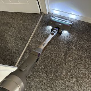 Shark PowerDetect Clean and Empty Cordless Vacuum tackling carpet