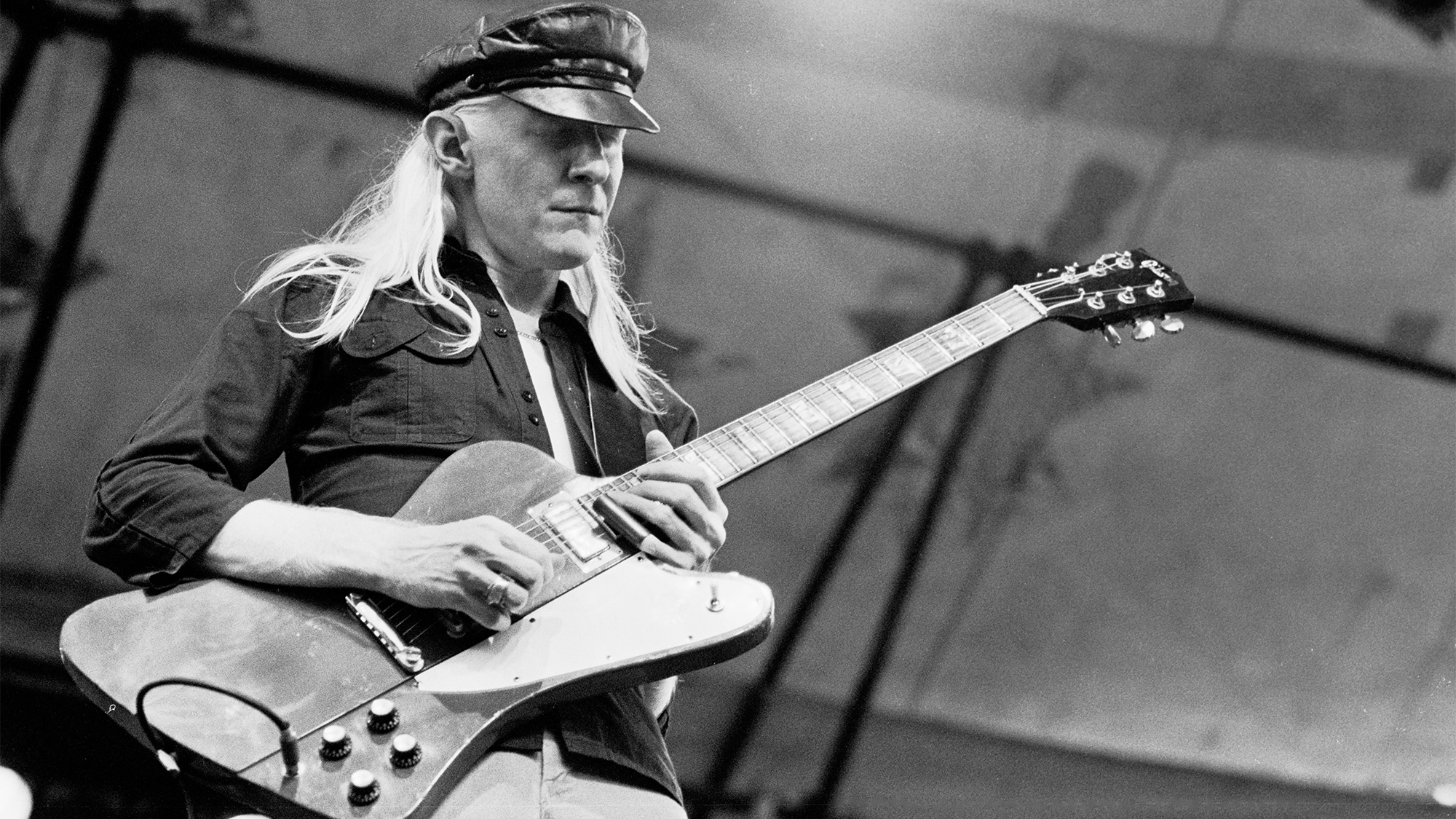 American Blues and Rock musician Johnny Winter (1944 - 2014) plays electric guitar as he performs onstage during the Dr Pepper Central Park Music Festival, New York, New York, July 30, 1980.