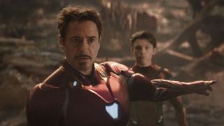 Tony Stark pointing to Drax while talking to Star-Lord