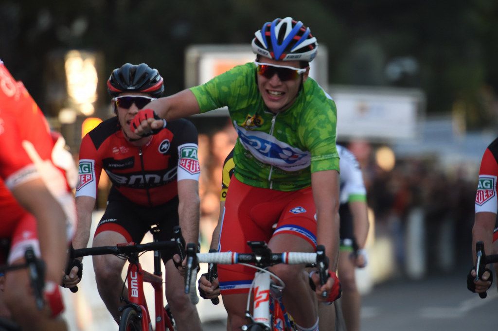 Arthur Vichot punches the air as he crosses the line