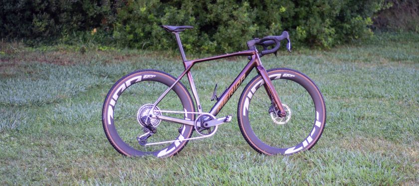 A Merida Mission gravel bike on some grass 