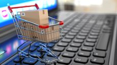 Small shopping cart on a keyboard