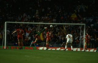 30 May 1984: Pruzzo (second right) #5 of A S Roma beats Bruce Grobbelaar (second left) Liverpool's goalkeeper to score during the European Cup Final at the Olympic Stadium in Rome. The match ended in a 1-1 draw but Liverpool won 4-2 on penalties. \ Mandatory Credit: David Cannon/Allsport