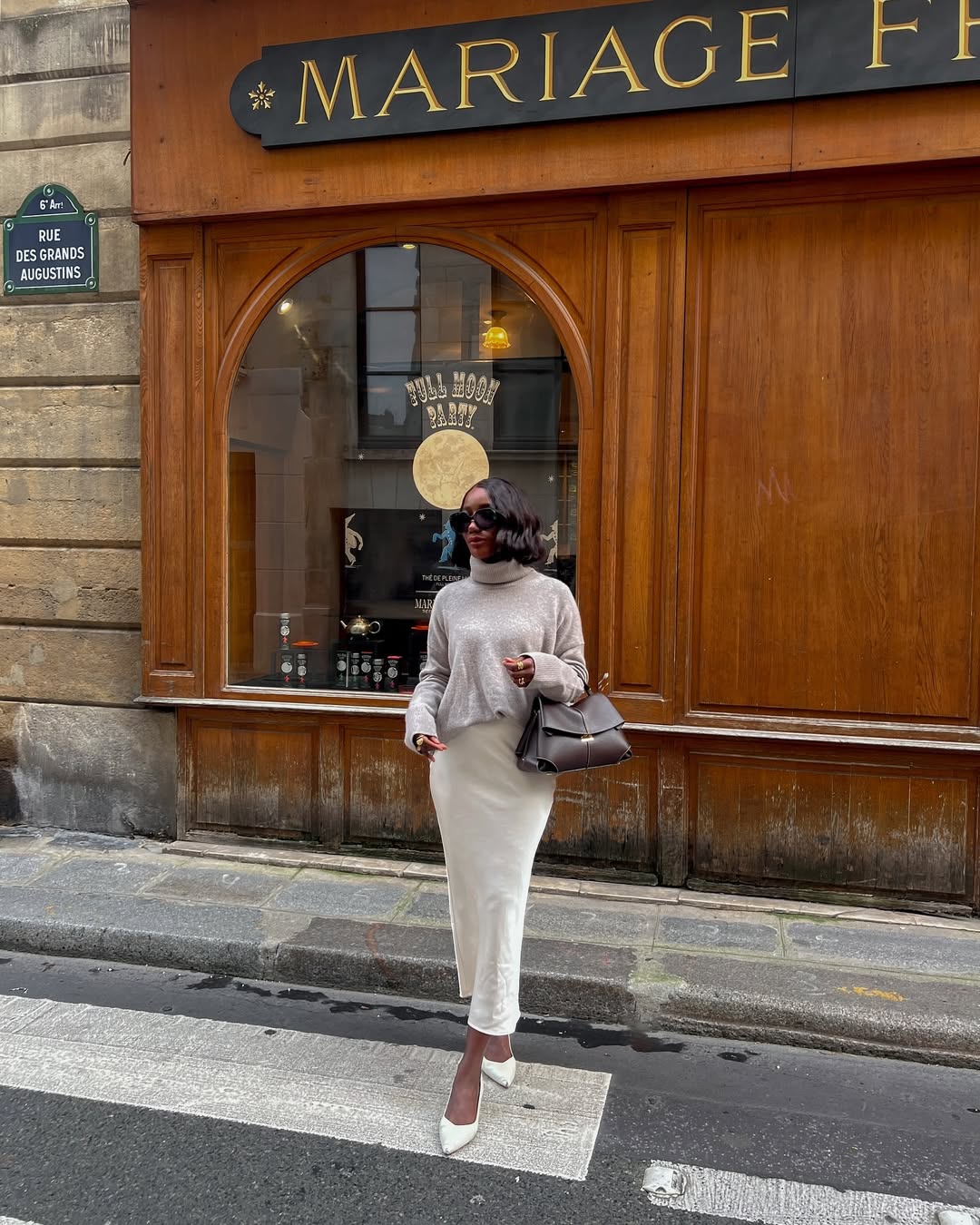 Aïda BADJI in white satin skirt