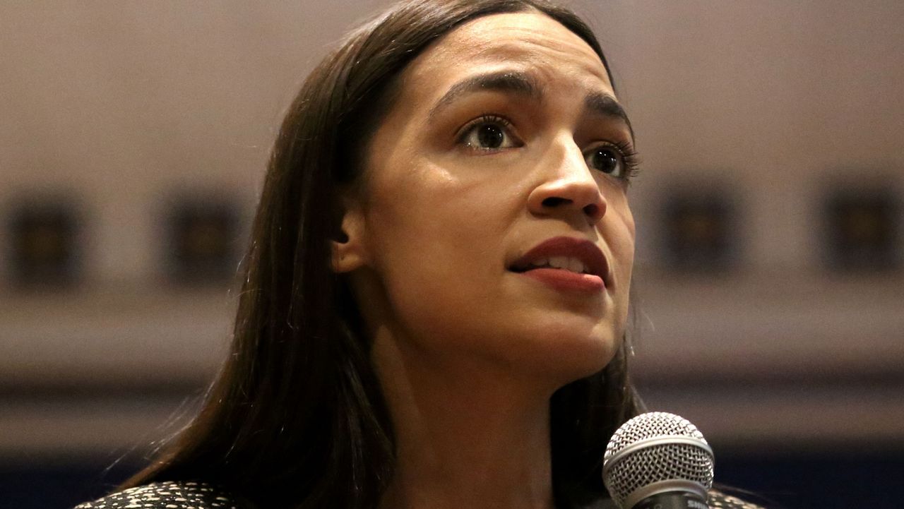 new york, ny december 14 rep alexandria ocasio cortez d ny speaks with members of the media before a new green deal for public housing town hall on december 14, 2019 in the queens borough of new york city photo by yana paskovagetty images