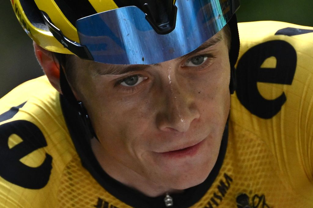Stage winner JumboVisma teams Danish rider Jonas Vingegaard reacts at the end of the eighth and last stage of the 74th edition of the Criterium du Dauphine cycling race 1375 km between SaintAlbanLeysse and Plateau de Solaison on June 12 2022 Photo by Marco BERTORELLO AFP Photo by MARCO BERTORELLOAFP via Getty Images