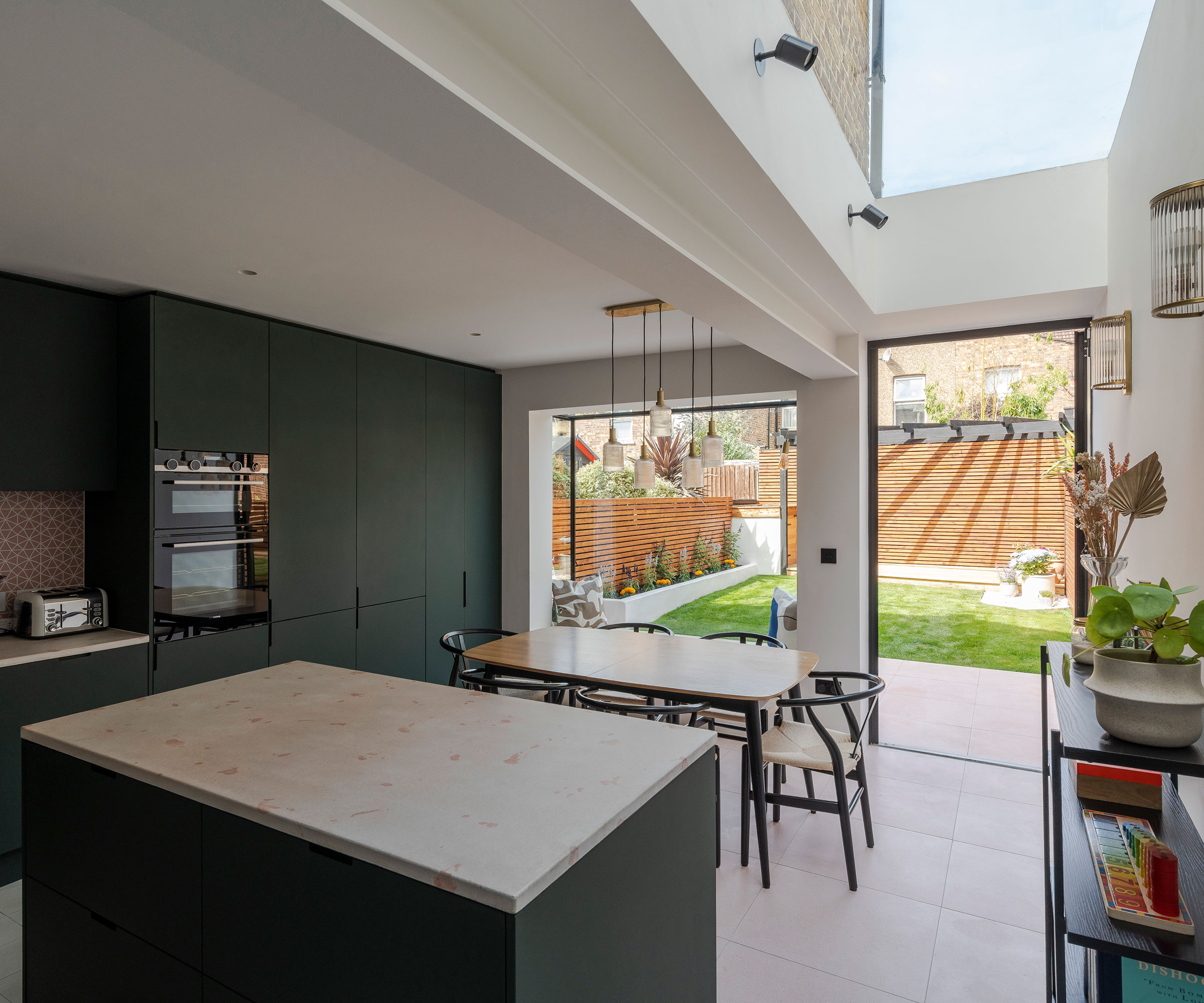side return kitchen extension with glass ceiling and picture window