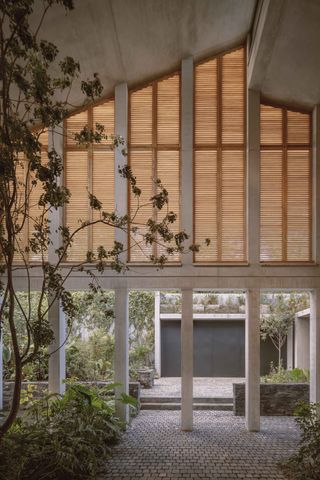 inside looking out at Parque Via house by SOA