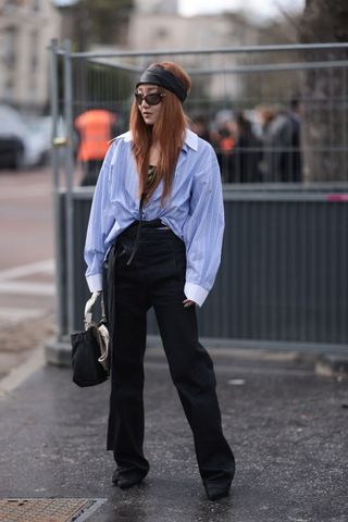 A woman at Paris Fashion Week with super-long hair/the anti-bob trend