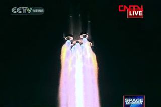 China's Shenzhou 8 spacecraft launched into Earth orbit on Oct. 31, 2011 atop a Long March 2F rocket. This close-up shot shows the rocket in action, shortly after liftoff.