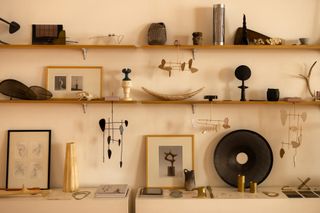 Federico Stefanovich, photographed by Maureen M Evans, in his Mexico City studio,with his ‘Folia’ floor lamp, and ‘Temis’ candleholder @federico.stefanovich