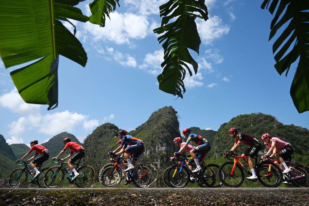NONGLA CHINA OCTOBER 19 LR Amund Grondahl Jansen of Norway and Team Jayco AlUla Daan Hoole of The Netherlands and Team Lidl Trek Omar Fraile of Spain and Team INEOS Grenadiers and a general view of the peloton competing during the 5th GreeTour Of Guangxi 2024 Stage 5 a 1658km stage from Yizhou to Nongla 641m UCIWT on October 19 2024 in Nongla China Photo by Dario BelingheriGetty Images