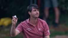 Ollie Schniederjans holds his ball up to acknowledge the crowd at the International Series India