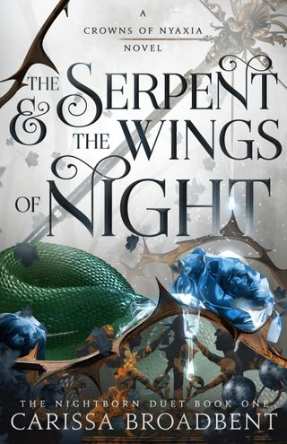 the serpent & the wings book cover with a snake and blue rose 