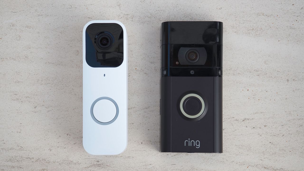 a photograph of a blink and Ring doorbell on a stone surface