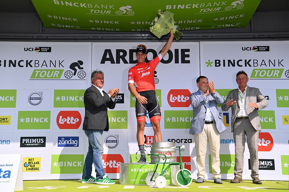 Jasper Stuyven (Trek Segafredo) celebrates on the podium after winning stage 4 of the BinckBank Tour