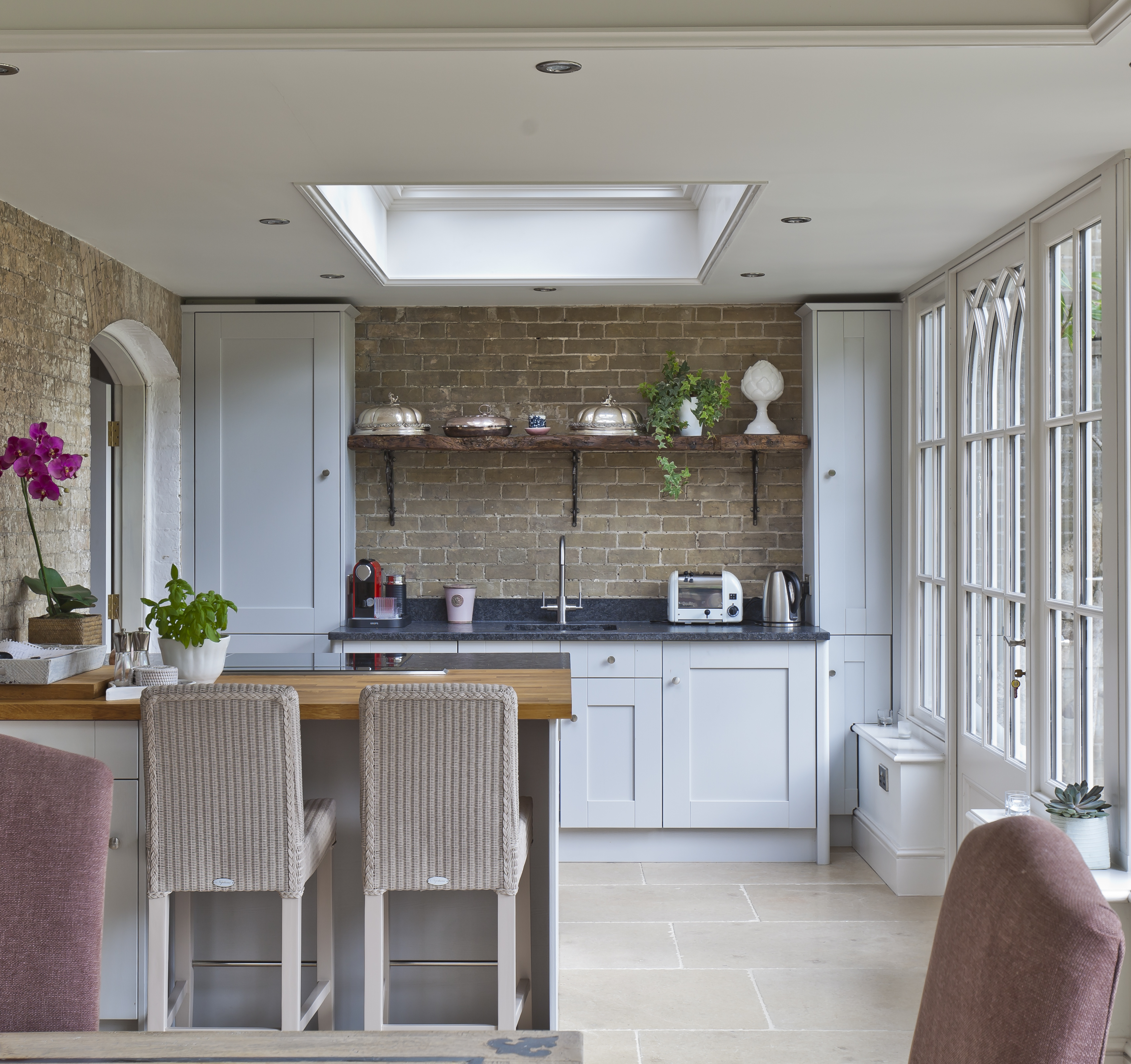 Mid room rooflight in traditional kitchen