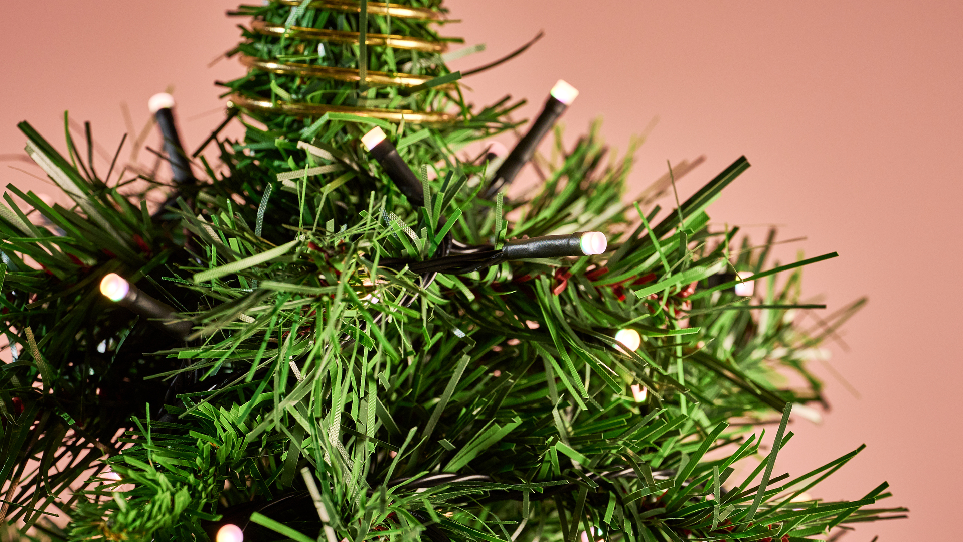 A close-up of the Nanoleaf Smart Holiday String Lights on a Christmas tree.