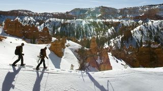A person snowshoeing in Bryce Canyon