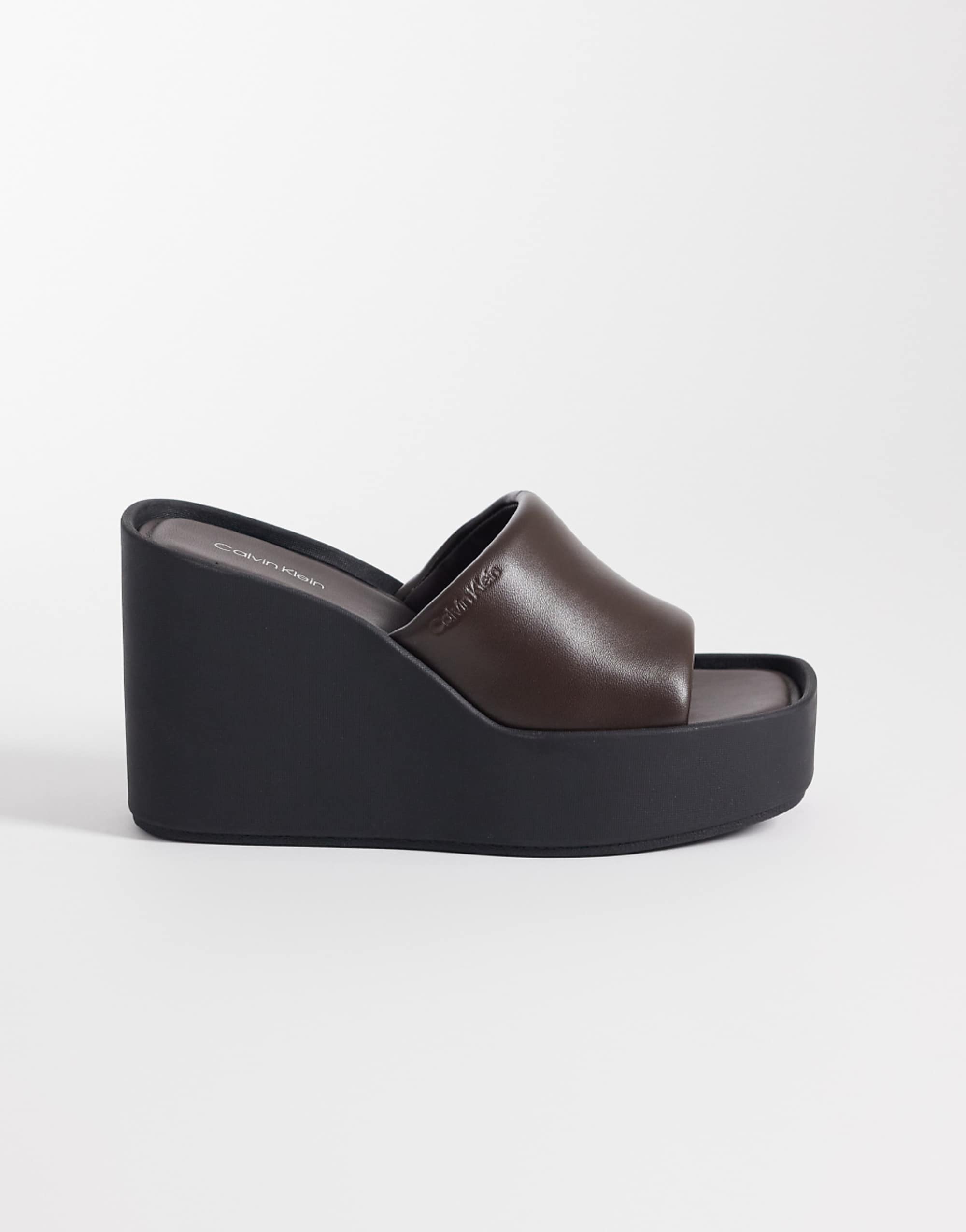 Calvin Klein Jeans Leather Wedge Mule Sandal in Brown