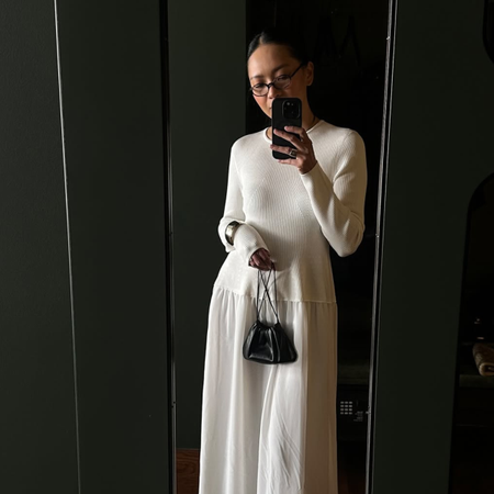 Dawn in a white drop-waist dress
