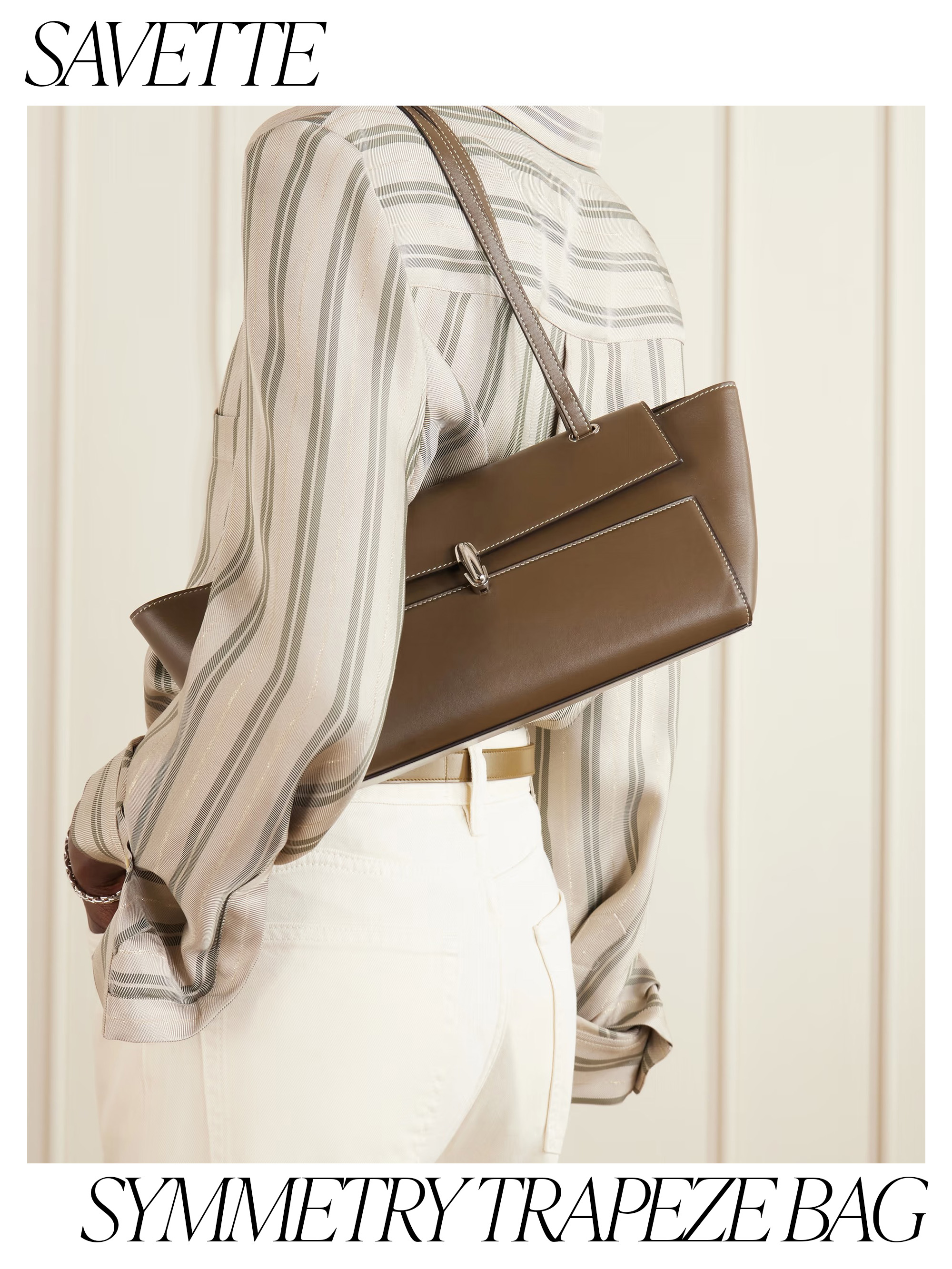 a detail image of a Savette Symmetry Trapeze Bag on a Net-a-Porter model