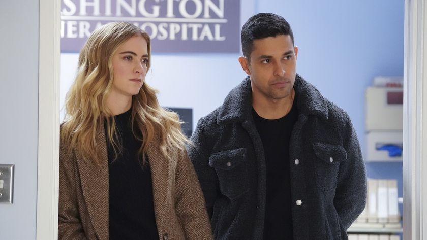 Ellie Bishop and Nick Torres standing next to each other inside of a hospital in NCIS