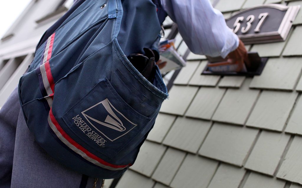 A USPS letter carrier