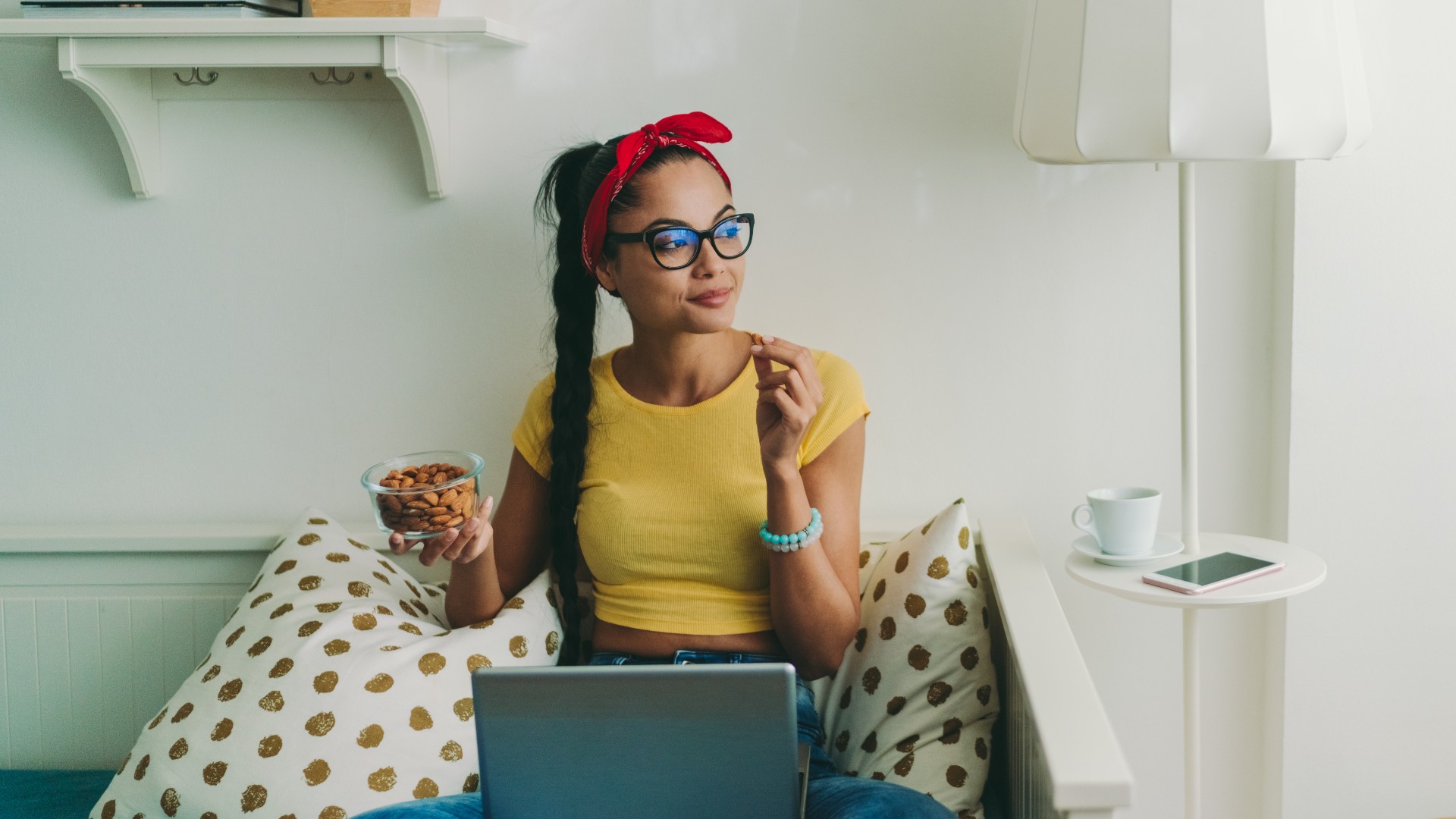 Woman eating almonds