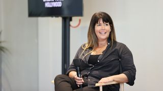 Patty Jenkins sitting in a director's chair
