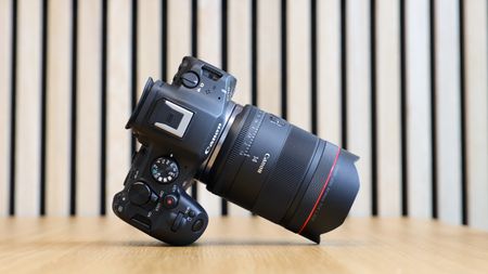 Canon EOS R6 Mark III camera with Canon RF 14mm f/1.4L VCM lens attached, on a wooden table