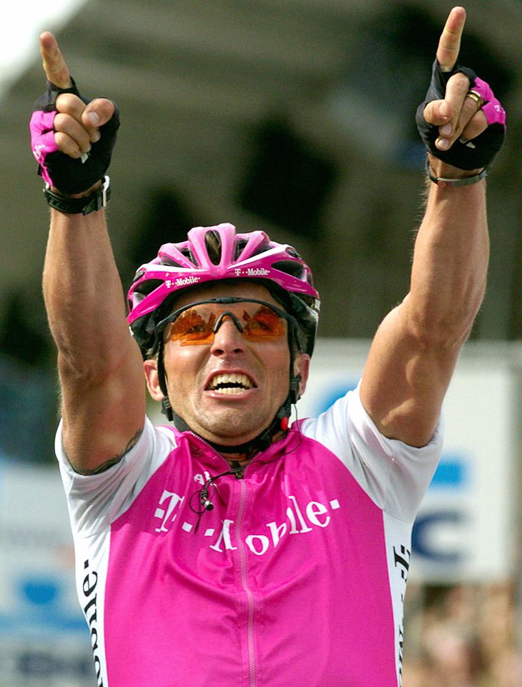 German Steffen Wesemann celebrates as he wins the 2004 Ronde van Vlaanderen.