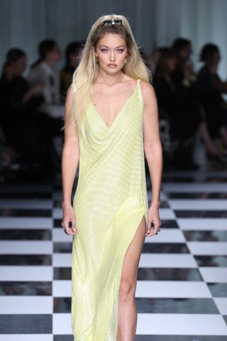 Gigi Hadid walks in Versace