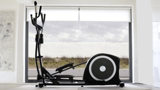 JTX Fitness Elliptical in a living room