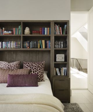 girl's bedroom with bookcase headboard