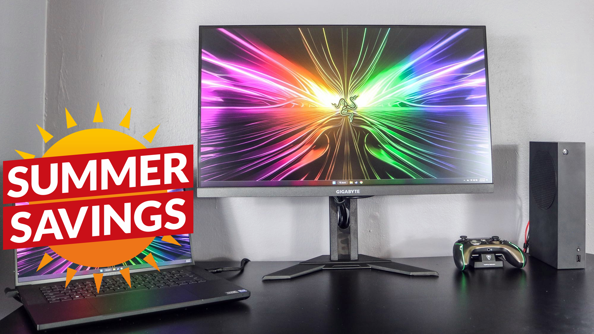 Gigabyte M28U gaming monitor with Summer Savings deal tag superimposed